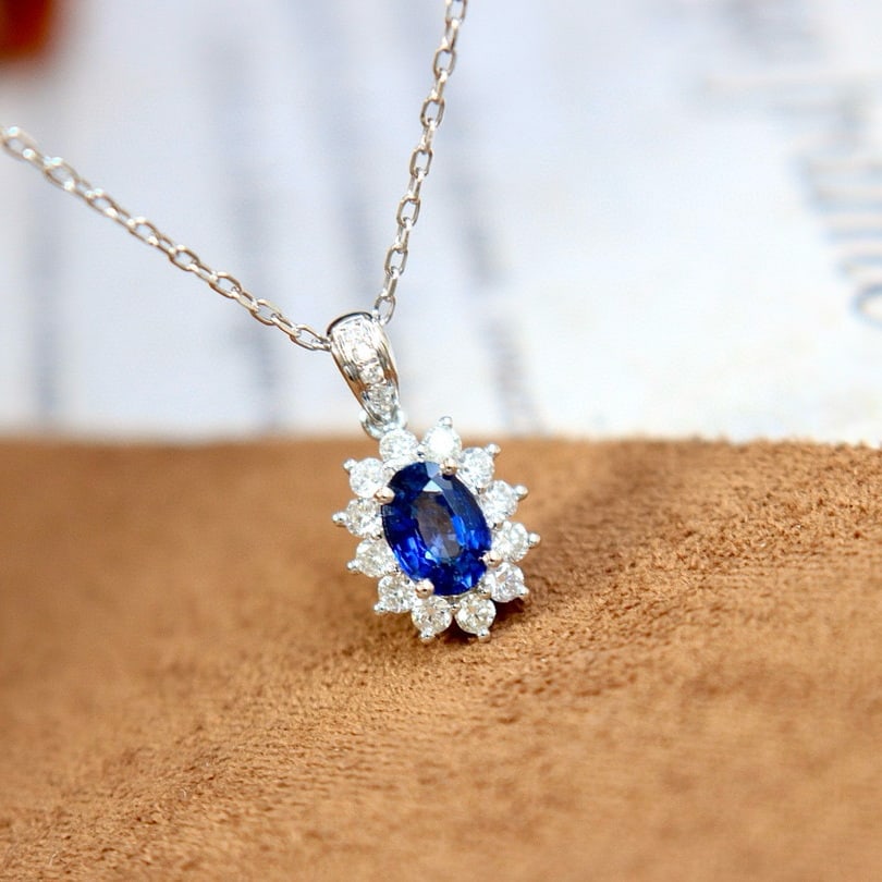 14k Gold 0.83 Ctw Natural Sapphire & Diamond Necklace: Ref:230996375 // gold content:14k gold // main gemstone:sapphire // shape:oval // carat weight:0. 6ct // color:royal blue // treatment:natural // // adjacent gemstone 2 : diamond // shape:round // car