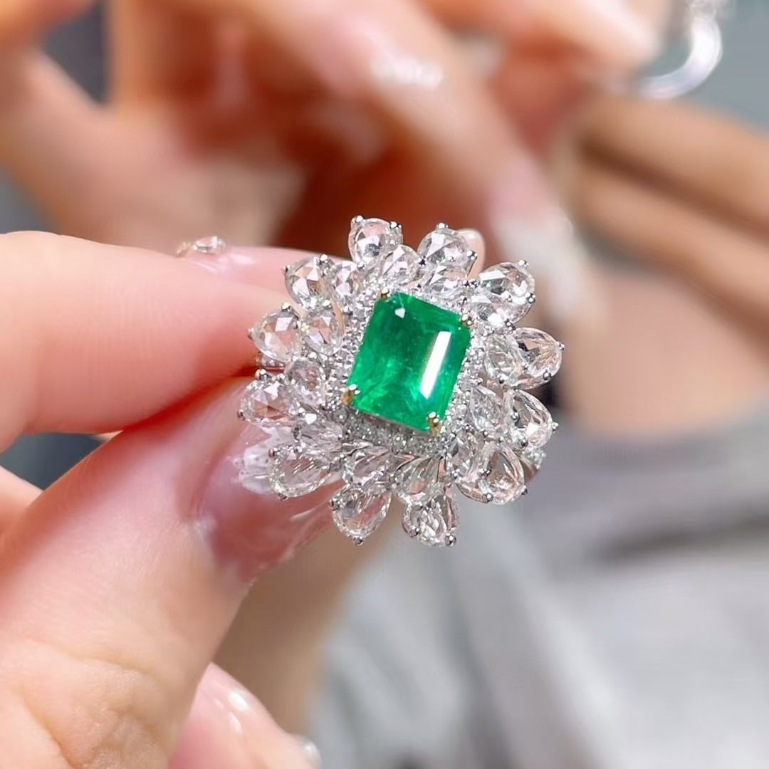 14k Gold 2.90 Ctw Vivid Green Natural Emerald & Sapphire Ring: Ref:230996416 // gold content:14k gold // ring size:7. 25us // // main gemstone:emerald // shape:octagonal // carat weight:1. 20ct // color:vivid green // treatment:natural // // adjacent gemstone 2