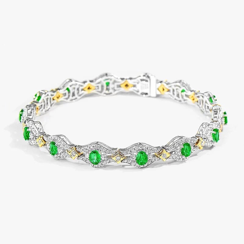 14k Gold 3.85 Ctw Vivid Green Natural Emerald & Diamond Bracelet: Ref:230997012 // gold content:14k gold // main gemstone:emerald // shape:oval // carat weight:2. 23ct // color:vivid green // treatment:natural // // adjacent gemstone 2 : diamond // shape:round //