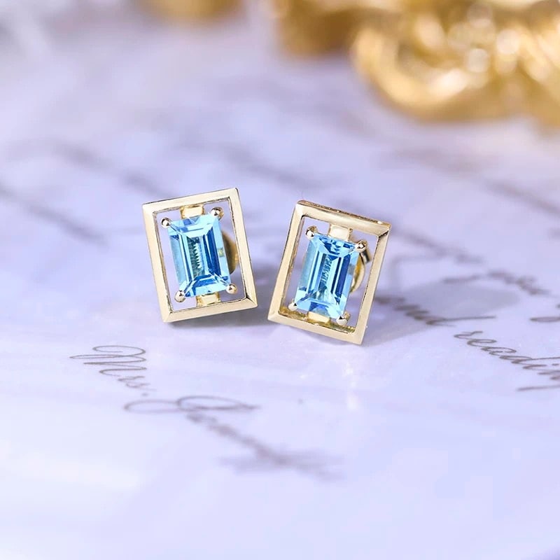 14k Gold 1.1 Ct Natural Aquamarine Earrings: Ref:230997009 // gold content:14k gold // main gemstone:aquamarine // shape:rectangle // carat weight:1. 1ct // color:blue // treatment:natural // High Estimate: 3000 Condition: New Low Estimate: 2000