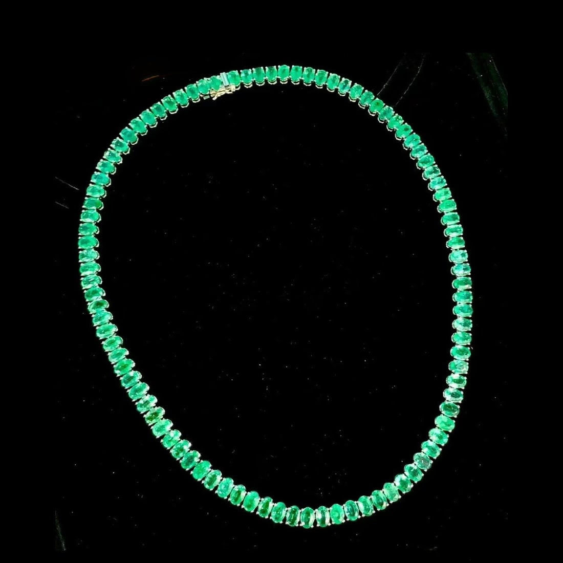 14k Gold 39.2 Ct Vivid Green Natural Emerald Necklace: Ref:230997013 // gold content:14k gold // main gemstone:emerald // shape:oval // carat weight:39. 2ct // color:vivid green // treatment:natural // High Estimate: 36000 Condition: New Low Estimate: