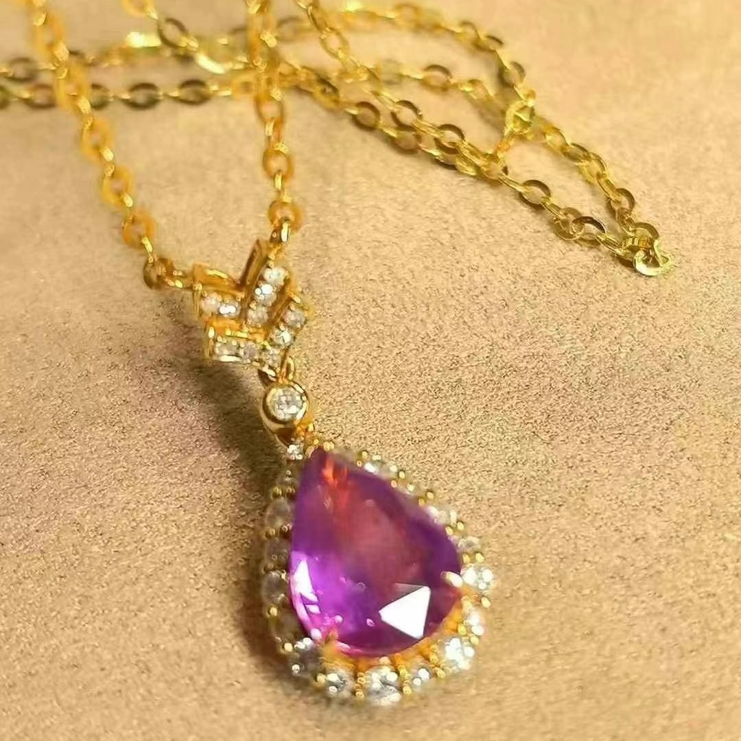 14k Gold 1.90 Ctw Natural Sapphire & Diamond Necklace: Ref:230997059 // gold content:14k gold // main gemstone:sapphire // shape:pear // carat weight:1. 66ct // color:purple // treatment:natural // // adjacent gemstone 2 : diamond // shape:round // carat