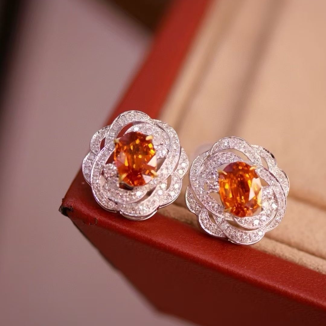 14k Gold 2.77 Ctw Natural Spessartine & Diamond Earrings: Ref:230997067 // gold content:14k gold // main gemstone:spessartine // shape:oval // carat weight:2. 26ct // color:orange // treatment:natural // // adjacent gemstone 2 : diamond // shape:round //