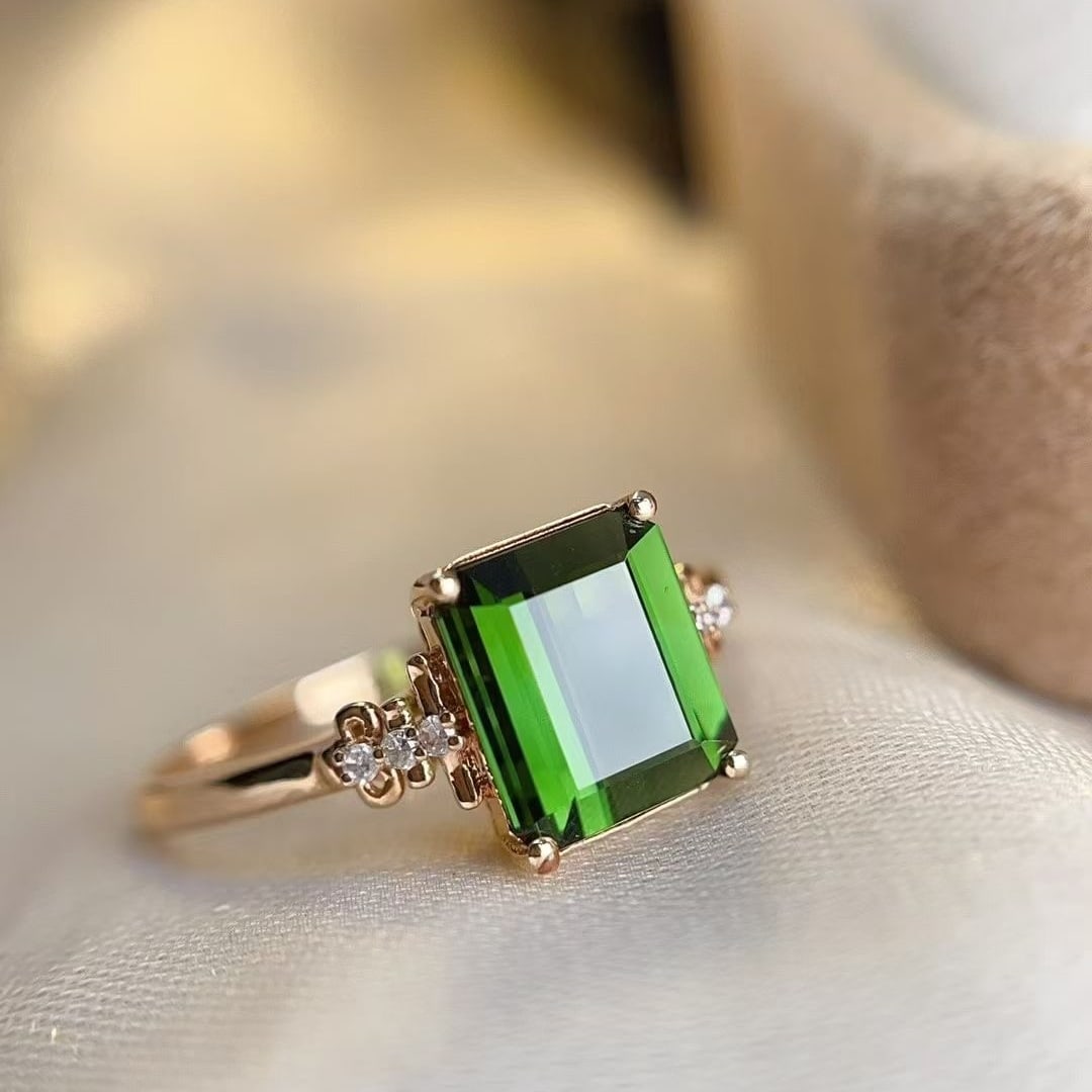 14k Gold 2 Ct Natural Tourmaline & Diamond Ring: Ref:230997064 // gold content:14k gold // ring size:7. 25us // // main gemstone:tourmaline // shape:octagonal // carat weight:2ct // color:green // treatment:natural // // adjacent gemstone 2 :