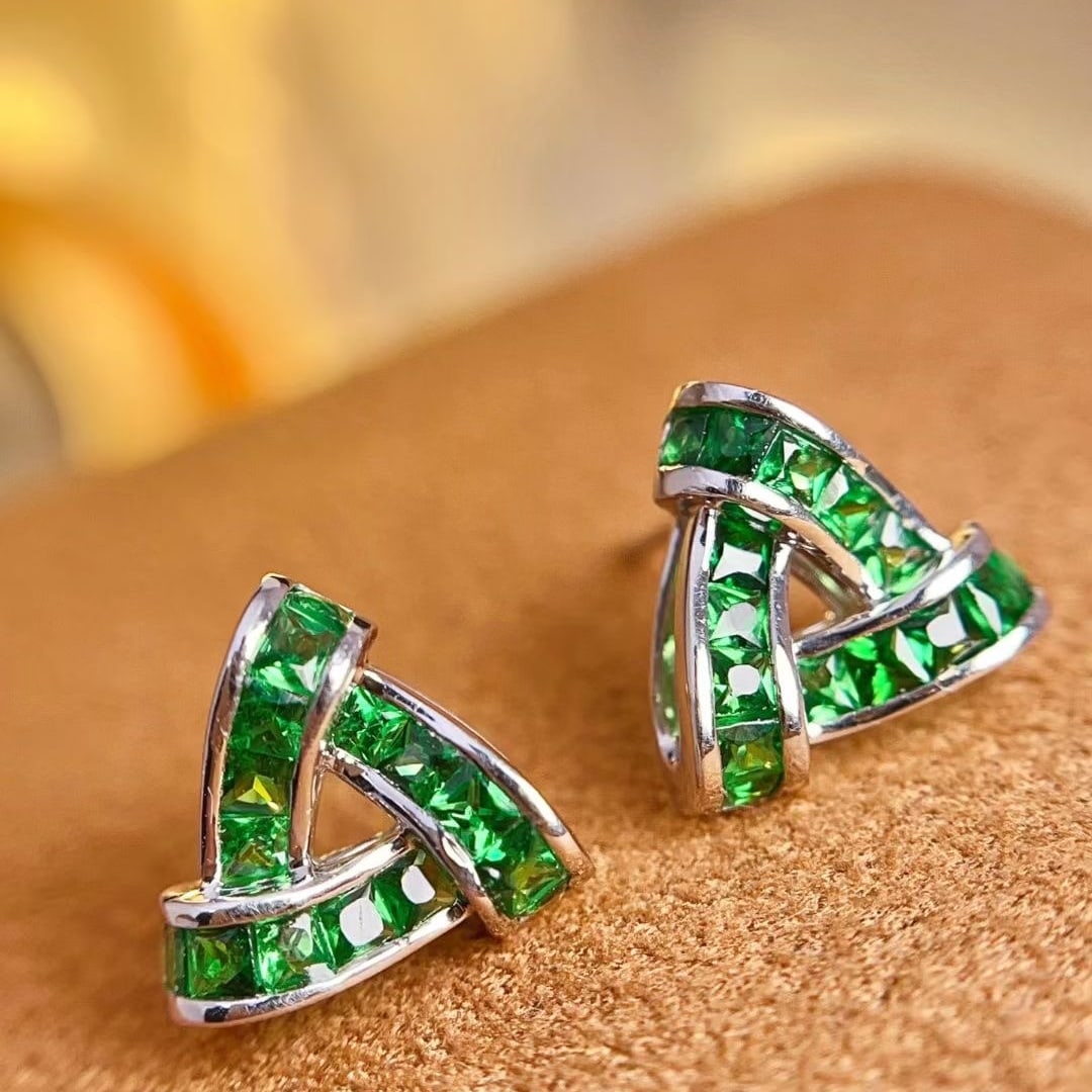 14k Gold 1.35 Ct Vivid Green Natural Tsavorite Earrings: Ref:230997066 // gold content:14k gold // main gemstone:tsavorite // shape:princess // carat weight:1. 35ct // color:vivid green // treatment:natural // High Estimate: 3000 Condition: New Low Estimate