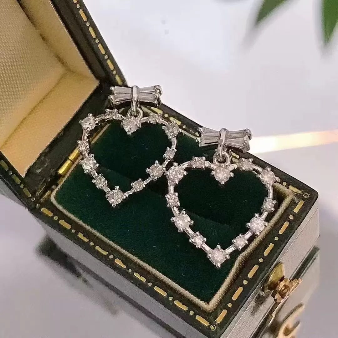 14k Gold 0.58 Ct Natural H Diamond Earrings: Ref:230997077 // gold content:14k gold // main gemstone:diamond // shape:multiply // carat weight:0. 58ct // clarity grade:vs-si // color:h // treatment:natural // Condition: New High Estimate: 2800