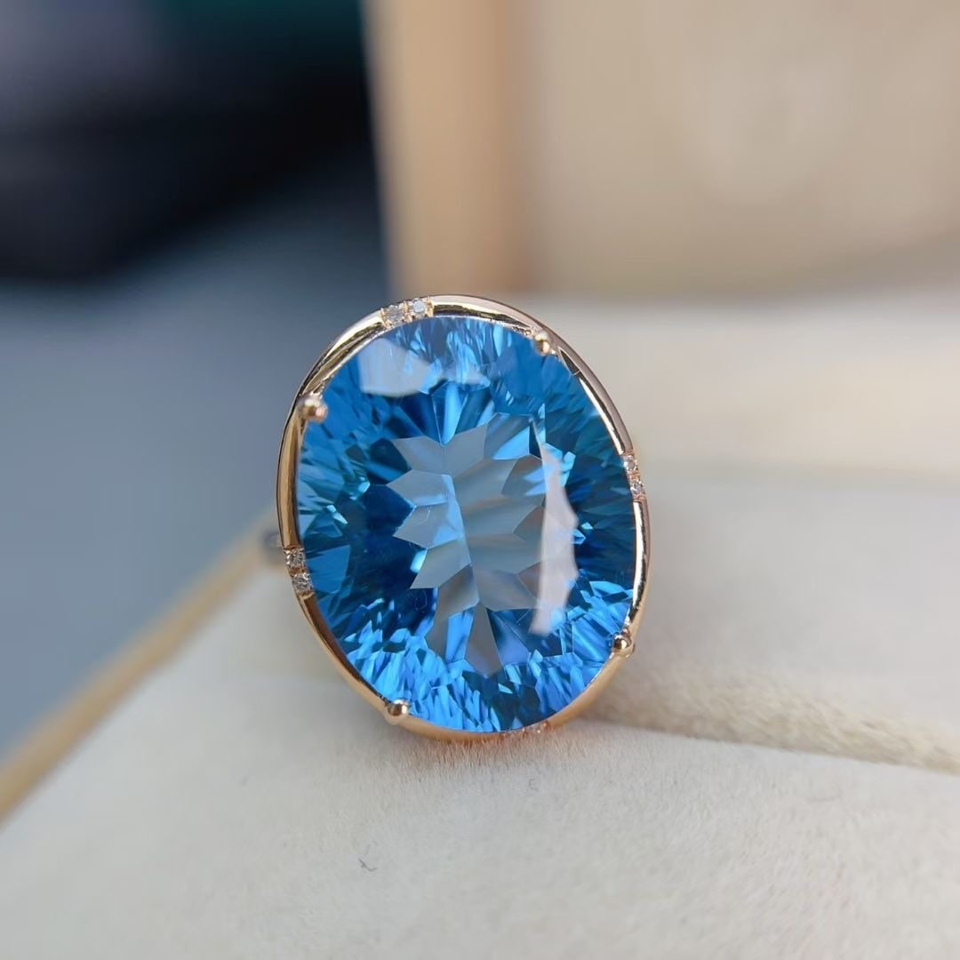14k Gold 17.05 Ct Natural Topaz & Diamond Ring: Ref:230997070 // gold content:14k gold // ring size:7. 25us // // main gemstone:topaz // shape:oval // carat weight:17. 05ct // color:blue // treatment:natural // // adjacent gemstone 2 : diamond //