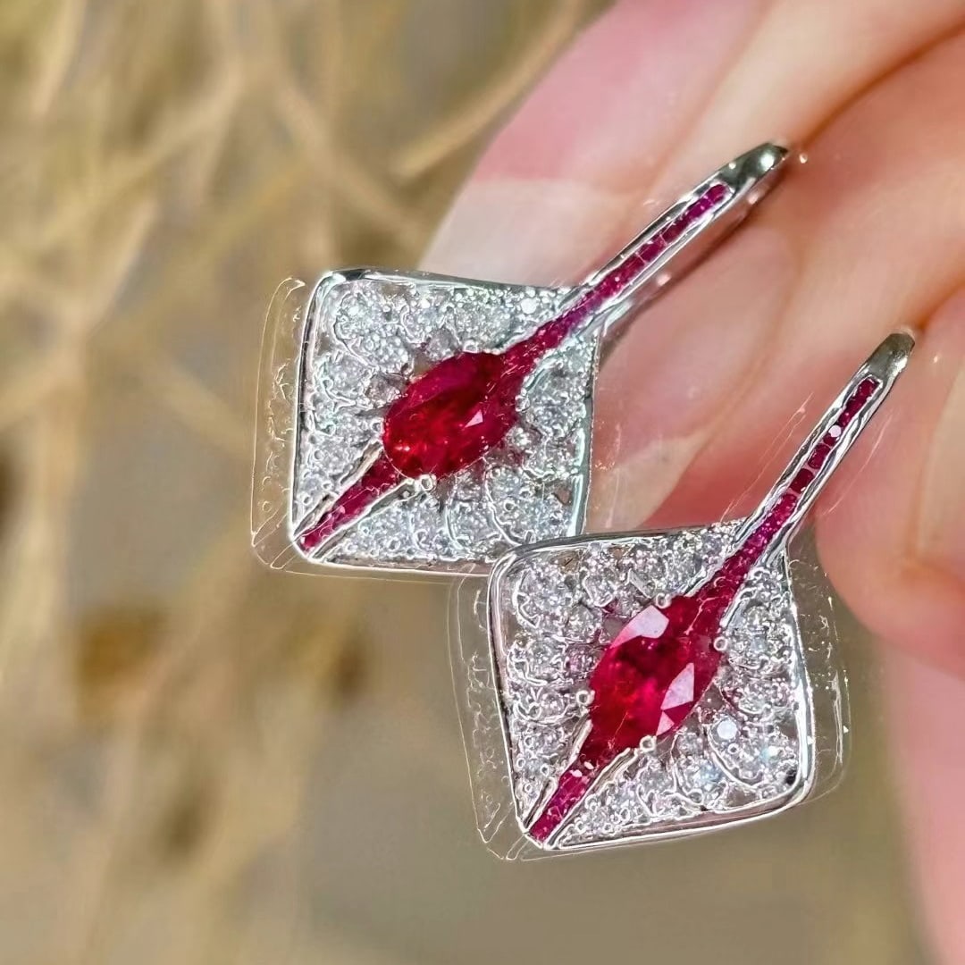 14k Gold 0.75 Ct Natural Ruby & Diamond Earrings: Ref:230997086 // gold content:14k gold // main gemstone:ruby // shape:oval // carat weight:0. 75ct // color:pigeonblood red // treatment:natural // // adjacent gemstone 2 : diamond // shape:round //