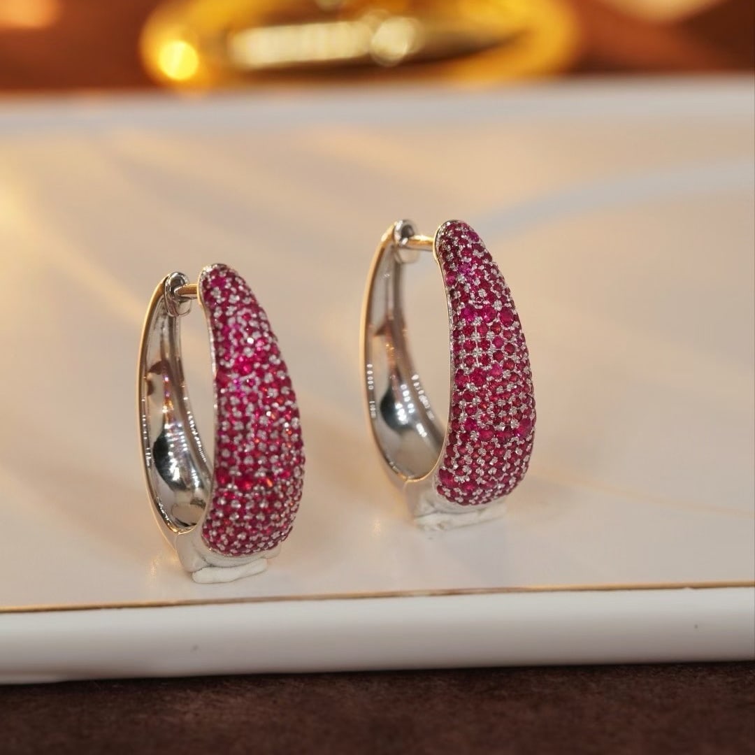 14k Gold 2.0 Ct Natural Ruby Earrings: Ref:230997095 // gold content:14k gold // main gemstone:ruby // shape:round // carat weight:2. 0ct // color:red // treatment:natural // cut grade:g // High Estimate: 6600 Low Estimate: 4400