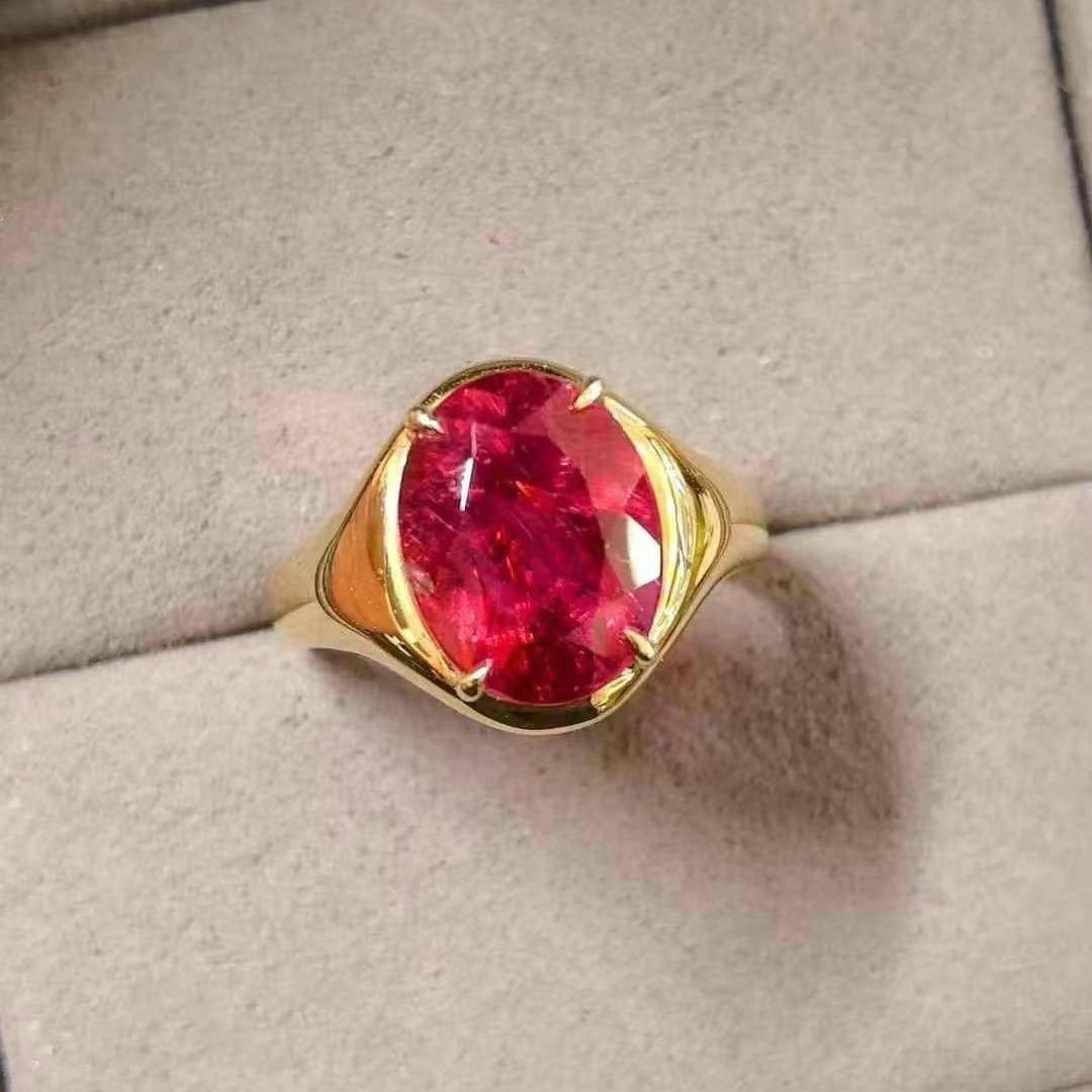 14k Gold 4.60 Ct Natural Tourmaline Ring: Ref:230997105 // gold content:14k gold // ring size:7. 25us // // main gemstone:tourmaline // shape:oval // carat weight:4. 60ct // color:red // treatment:natural // Low Estimate: 5500 Condition: New