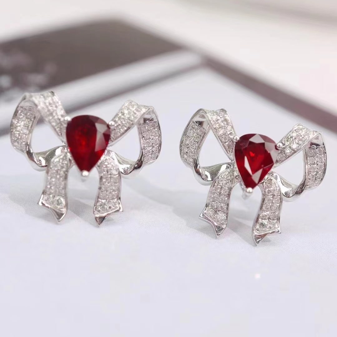 14k Gold 1.91 Ctw Natural Ruby & Diamond Earrings: Ref:230997111 // gold content:14k gold // main gemstone:ruby // shape:pear // carat weight:1. 5ct // color:pigeonblood red // treatment:natural // // adjacent gemstone 2 : diamond // shape:round //