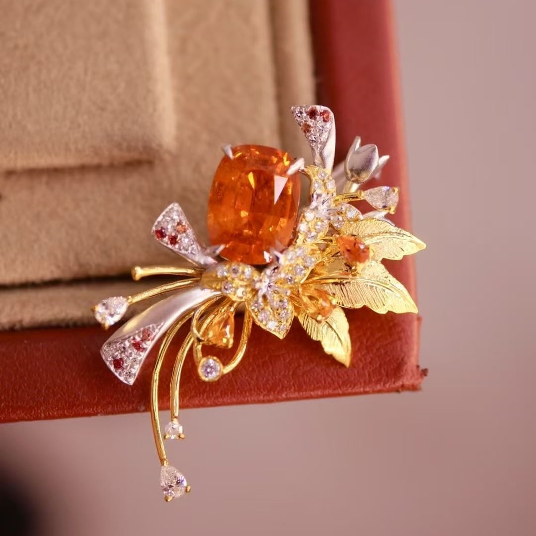 14k Gold 2.10 Ctw Natural Spessartine & Diamond Brooch: Ref:230997124 // gold content:14k gold // main gemstone:spessartine // shape:cushion // carat weight:1. 91ct // color:orange // treatment:natural // // adjacent gemstone 2 : diamond // shape:multiply
