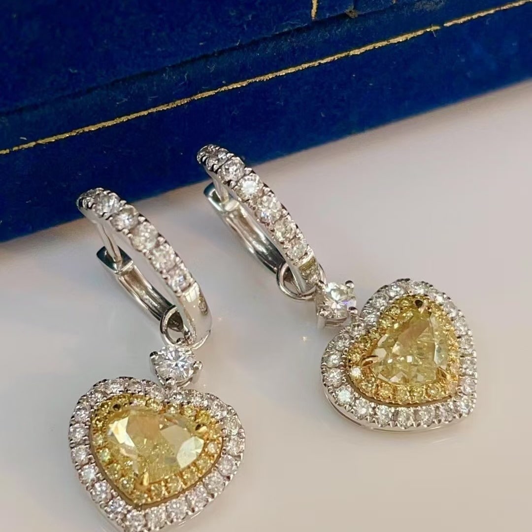14k Gold 3.10 Ctw Natural Yellow Diamond & Diamond Earrings: Ref:230997118 // gold content:14k gold // main gemstone:yellow diamond // shape:heart // carat weight:2. 00ct // color:yellow // treatment:natural // // adjacent gemstone 2 : diamond // shape:round