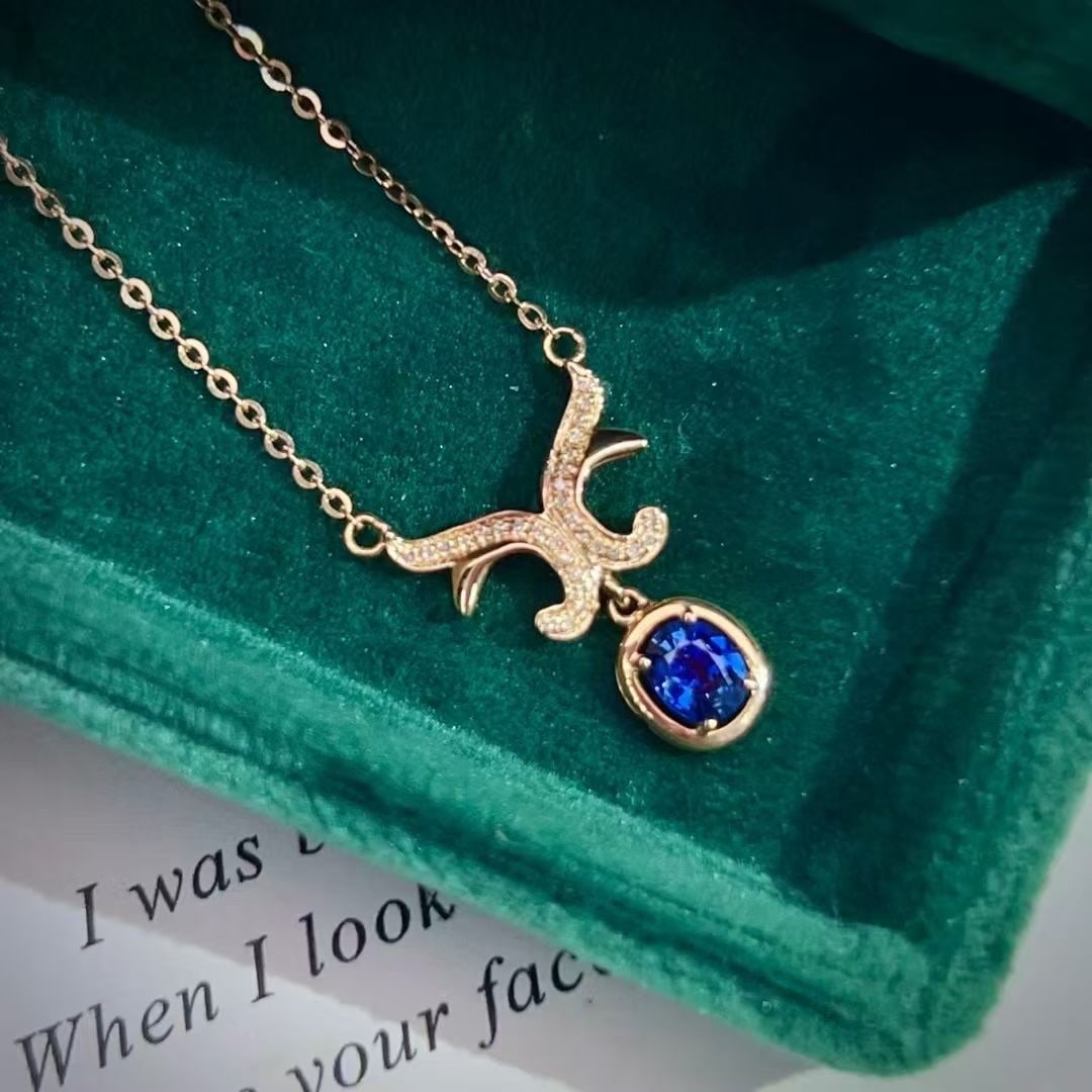 14k Gold 1 Ct Natural Sapphire & Diamond Necklace: Ref:230997126 // gold content:14k gold // main gemstone:sapphire // shape:oval // carat weight:1ct // color:royal blue // treatment:natural // // adjacent gemstone 2 : diamond // number of stones:30