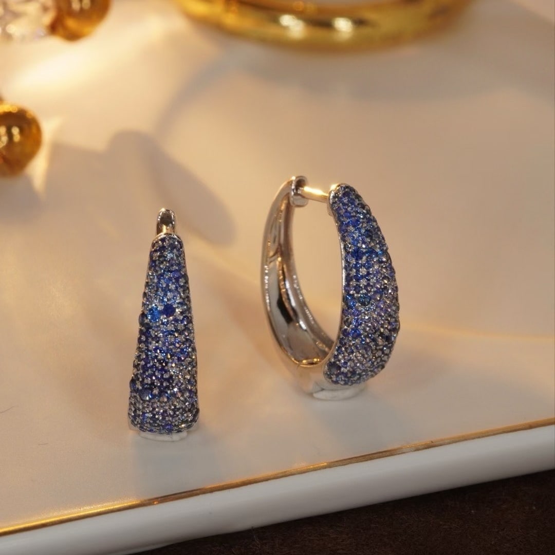 14k Gold 2.0 Ct Natural Sapphire Earrings: Ref:230997140 // gold content:14k gold // main gemstone:sapphire // shape:round // carat weight:2. 0ct // color:blue // treatment:natural // cut grade:g // High Estimate: 6600 Low Estimate: 4400