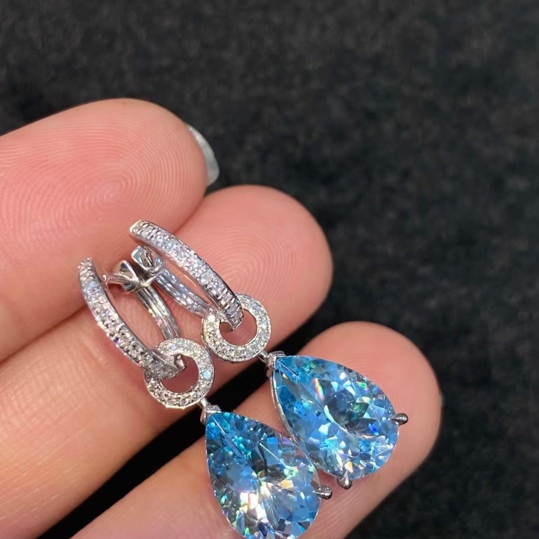 14k Gold 5.32 Ctw Natural Aquamarine & Diamond Earrings: Ref:230997151 // gold content:14k gold // main gemstone:aquamarine // shape:pear // carat weight:5. 08ct // color:santa maria color // treatment:natural // // adjacent gemstone 2 : diamond //