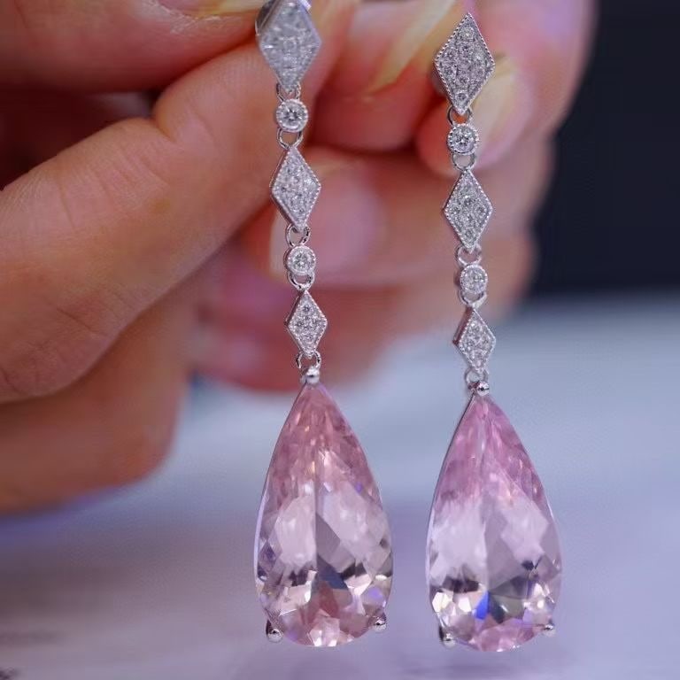 14k Gold 17.98 Ctw Natural Morganite & Diamond Earrings: Ref:230997157 // gold content:14k gold // main gemstone:morganite // shape:pear // carat weight:17. 68ct // color:pink // treatment:natural // // adjacent gemstone 2 : diamond // shape:round // carat 
