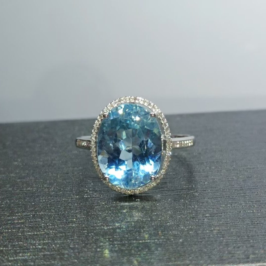 14k Gold 5.08 Ctw Natural Aquamarine & Diamond Ring: Ref:230997150 // gold content:14k gold // ring size:7. 25us // // main gemstone:aquamarine // shape:oval // carat weight:4. 9ct // color:santa maria color // treatment:natural // // adjacent gemstone