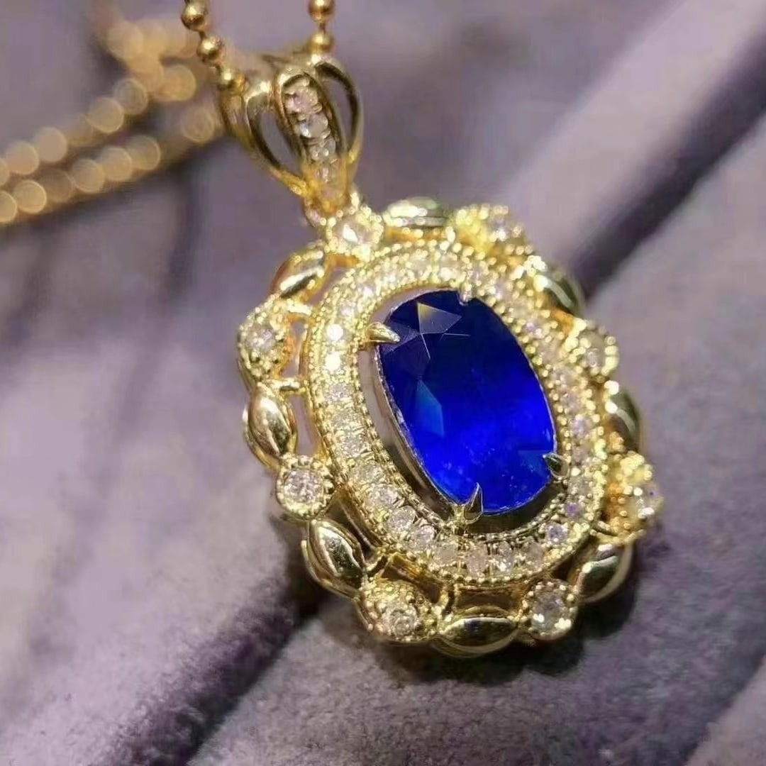 14k Gold 1.54 Ctw Vivid Blue Natural Sapphire & Diamond Pendant( Without Chain ): Ref:230997176 // gold content:14k gold // main gemstone:sapphire // shape:oval // carat weight:1. 33ct // color:vivid blue // treatment:natural // // adjacent gemstone 2 : diamond // shape:round //