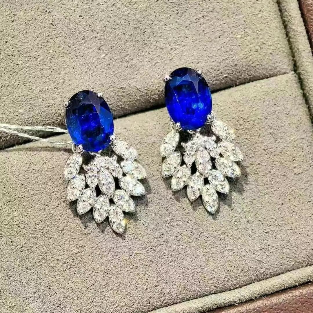 14k Gold 3.88 Ctw Natural Sapphire & Diamond Earrings: Ref:230997180 // gold content:14k gold // main gemstone:sapphire // shape:oval // carat weight:3. 18ct // color:royal blue // treatment:natural // // adjacent gemstone 2 : diamond // shape:round //
