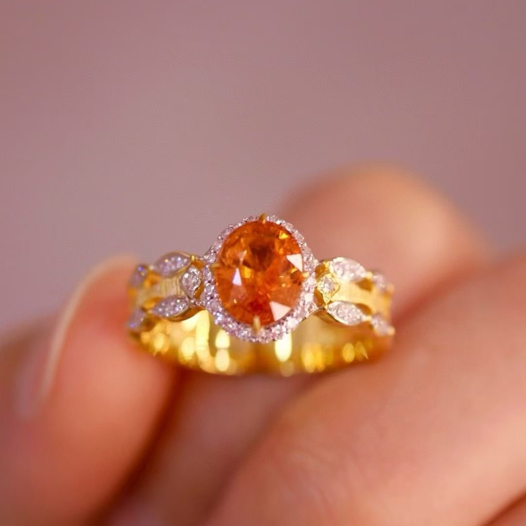 14k Gold 1.90 Ctw Natural Spessartine & Diamond Ring: Ref:230997204 // gold content:14k gold // ring size:7. 25us // // main gemstone:spessartine // shape:oval // carat weight:1. 59ct // color:orange // treatment:natural // // adjacent gemstone 2 :