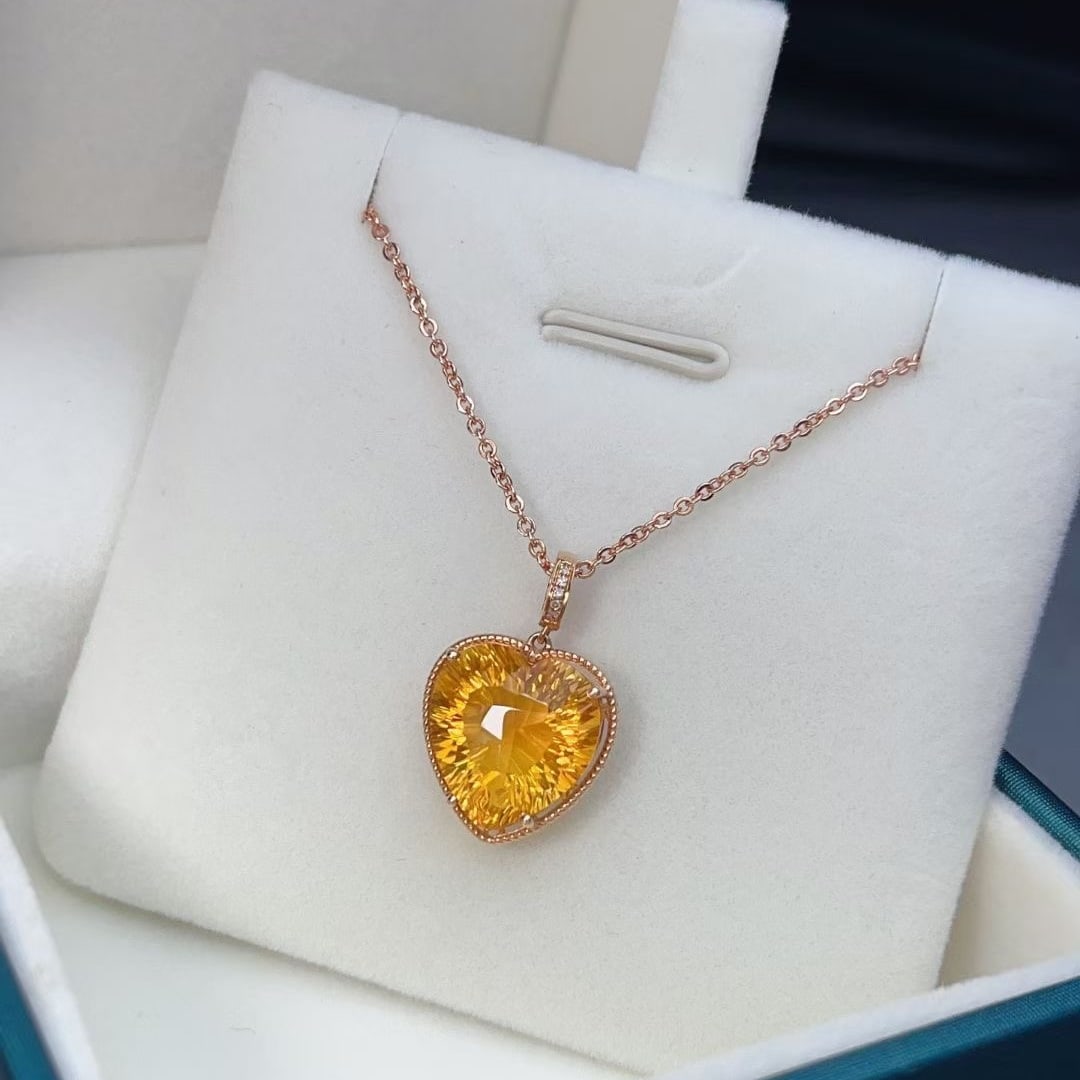 14k Gold 6.8 Ct Natural Citrine & Diamond Pendant( Without Chain ): Ref:230997207 // gold content:14k gold // main gemstone:citrine // shape:heart // carat weight:6. 8ct // color:yellow // treatment:natural // // adjacent gemstone 2 : diamond // number of stones:5 //