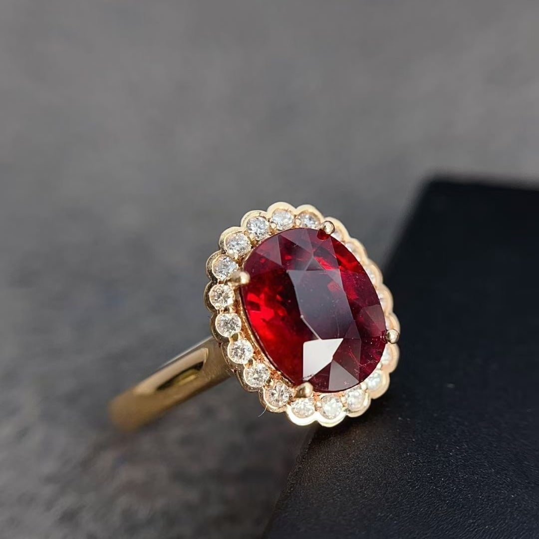 14k Gold 2.25 Ct Natural Tourmaline & Diamond Ring: Ref:230997211 // gold content:14k gold // ring size:7. 25us // // main gemstone:tourmaline // shape:oval // carat weight:2. 25ct // color:red // treatment:natural // // adjacent gemstone 2 : diamond