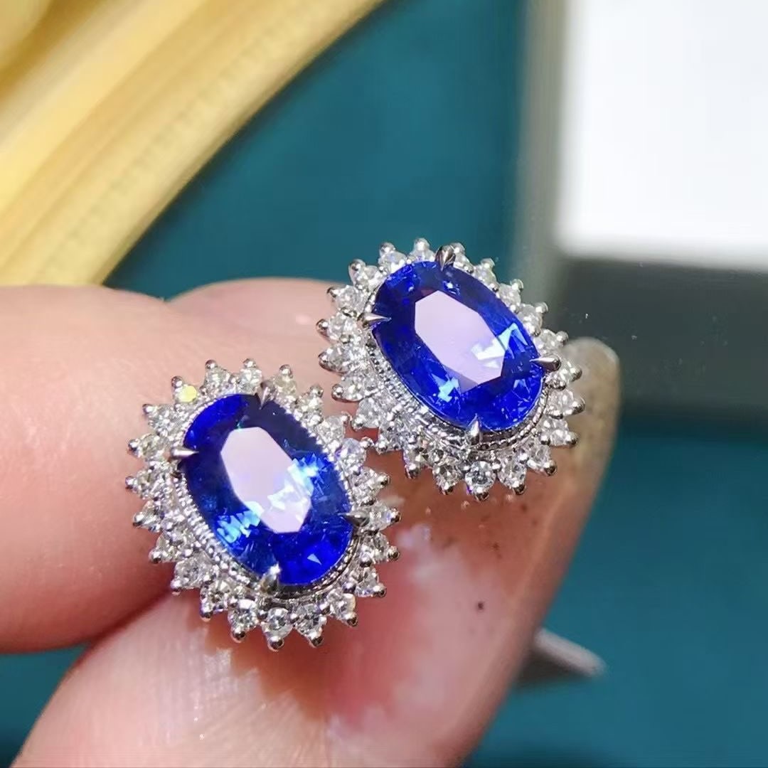 14k Gold 2.32 Ctw Vivid Blue Natural Sapphire & Diamond Earrings: Ref:230997229 // gold content:14k gold // main gemstone:sapphire // shape:oval // carat weight:2ct // color:vivid blue // treatment:natural // // adjacent gemstone 2 : diamond // shape:round // carat