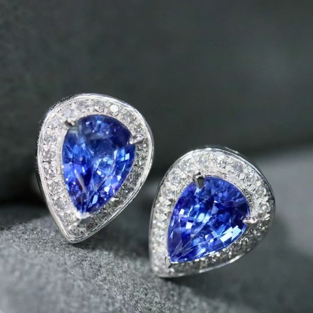 14k Gold 2.17 Ctw Natural Sapphire & Diamond Earrings: Ref:230997238 // gold content:14k gold // main gemstone:sapphire // shape:pear // carat weight:2ct // color:blue // treatment:natural // // adjacent gemstone 2 : diamond // shape:round // carat
