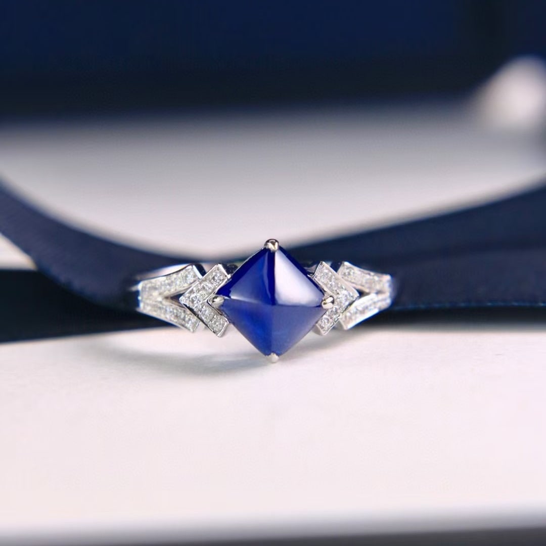 14k Gold 2.25 Ctw Natural Sapphire & Diamond Ring: Ref:230997254 // gold content:14k gold // ring size:7. 25us // // main gemstone:sapphire // shape:suger-loaf // carat weight:2. 15ct // color:royal blue // treatment:natural // // adjacent gemstone 2 