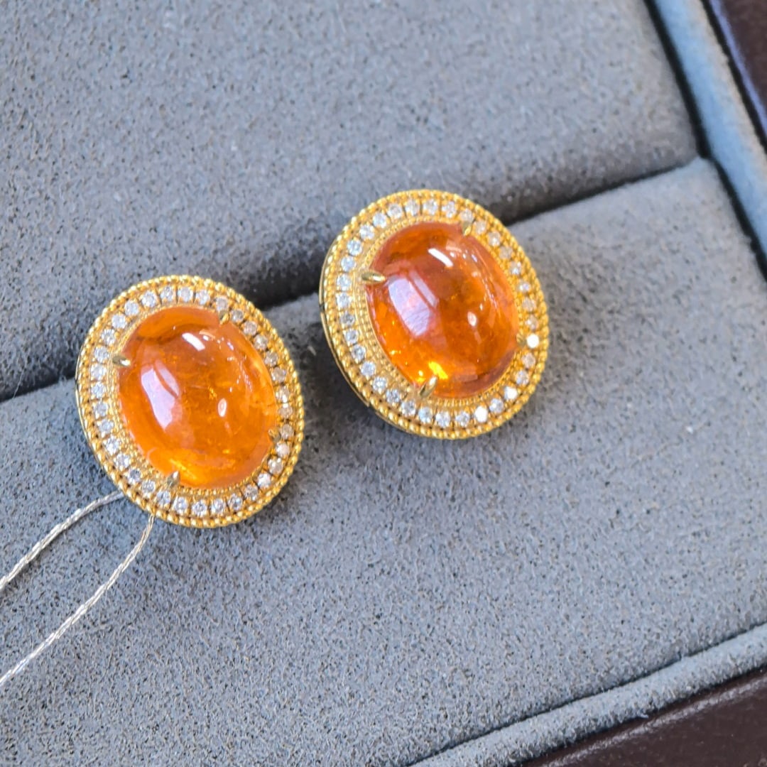 14k Gold 8.84 Ctw Natural Spessartine & Diamond Earrings: Ref:230998038 // gold content:14k gold // main gemstone:spessartine // shape:oval // carat weight:8. 58ct // color:orange // treatment:natural // // adjacent gemstone 2 : diamond // shape:round // car