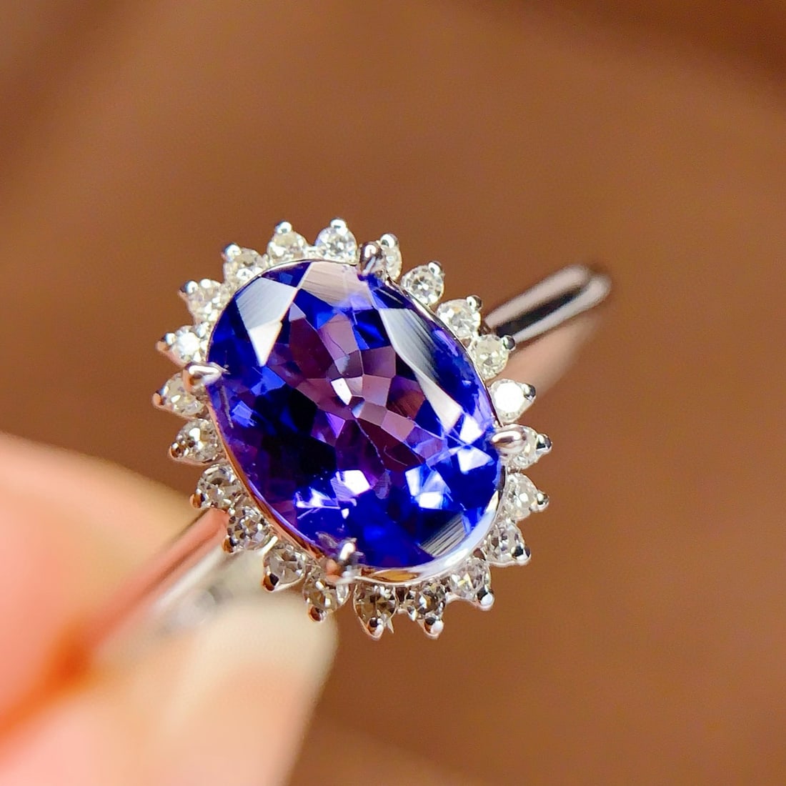 14k Gold 1.2 Ct Natural Tanzanite & Diamond Ring: Ref:230998055 // gold content:14k gold // ring size:7. 25us // // main gemstone:tanzanite // shape:oval // carat weight:1. 2ct // color:blue // treatment:natural // // adjacent gemstone 2 : diamond