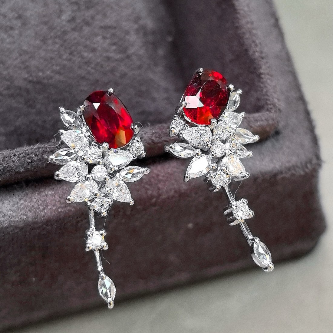 14k Gold 2.40 Ctw Natural Ruby & Diamond Earrings: Ref:230998062 // gold content:14k gold // main gemstone:ruby // shape:oval // carat weight:1. 45ct // color:pigeonblood red // treatment:natural // // adjacent gemstone 2 : diamond // shape:multiply /
