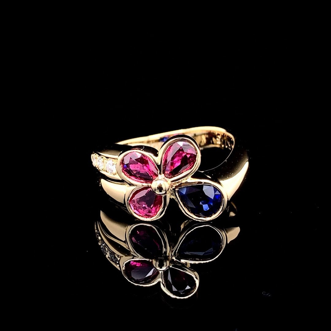 14k Gold 1.81 Ctw Natural Ruby & Sapphire Ring: Ref:230998090 // gold content:14k gold // ring size:7. 25us // // main gemstone:ruby // shape:pear // carat weight:1. 15ct // color:red // treatment:natural // // adjacent gemstone 2 : sapphire //
