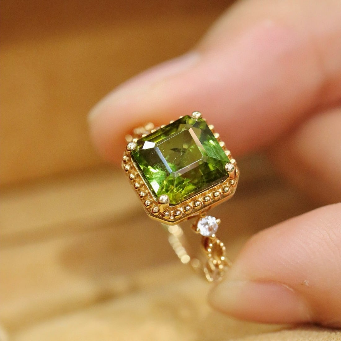 14k Gold 3.86 Ctw Natural Tourmaline & Sapphire Ring: Ref:230998104 // gold content:14k gold // ring size:7. 25us // // main gemstone:tourmaline // shape:octagonal // carat weight:3. 63ct // color:green // treatment:natural // // adjacent gemstone 2 :