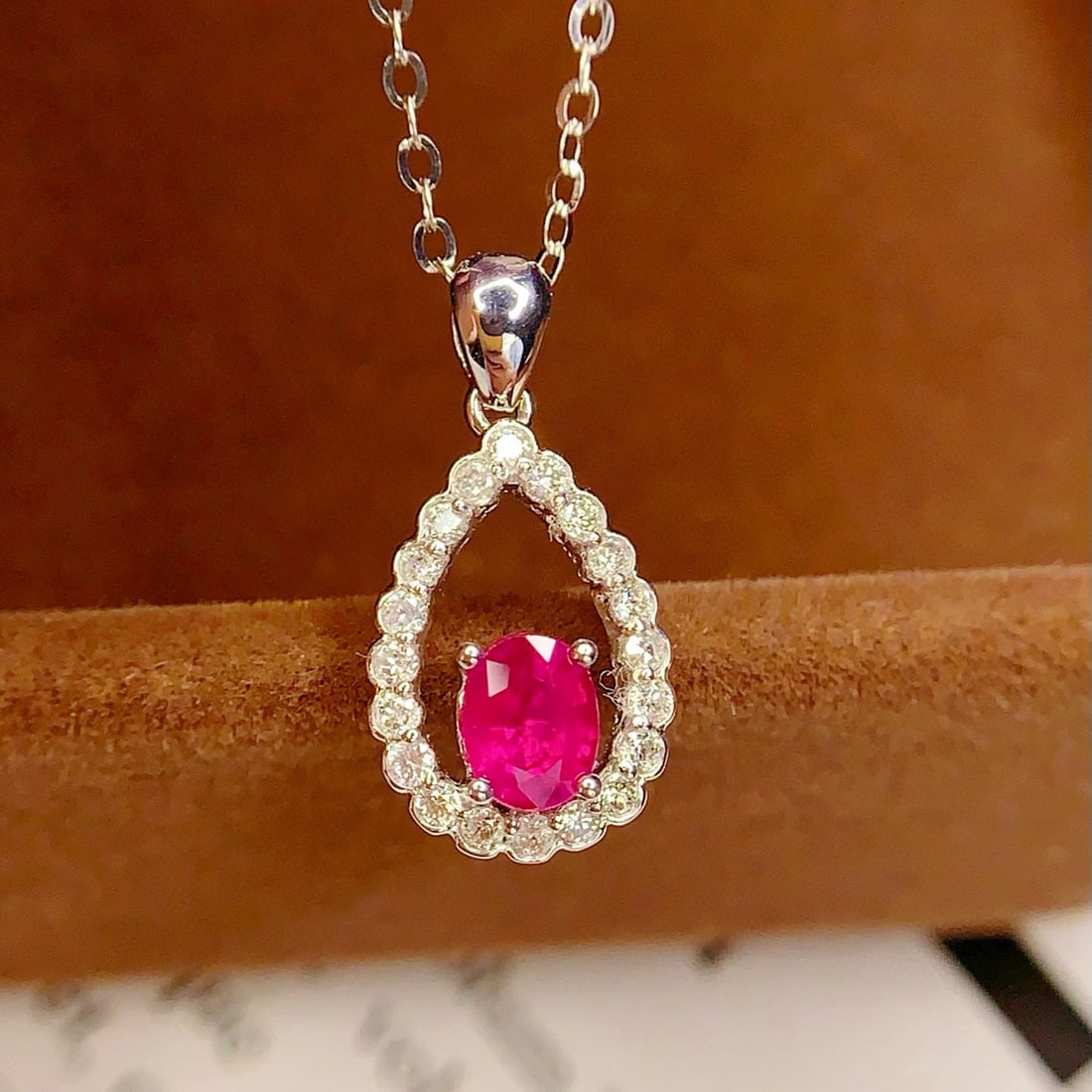 14k Gold 0.5 Ct Natural Ruby & Diamond Pendant( Without Chain ): Ref:230998176 // gold content:14k gold // main gemstone:ruby // shape:oval // carat weight:0. 5ct // color:red // treatment:natural // // adjacent gemstone 2 : diamond // number of stones:20 //