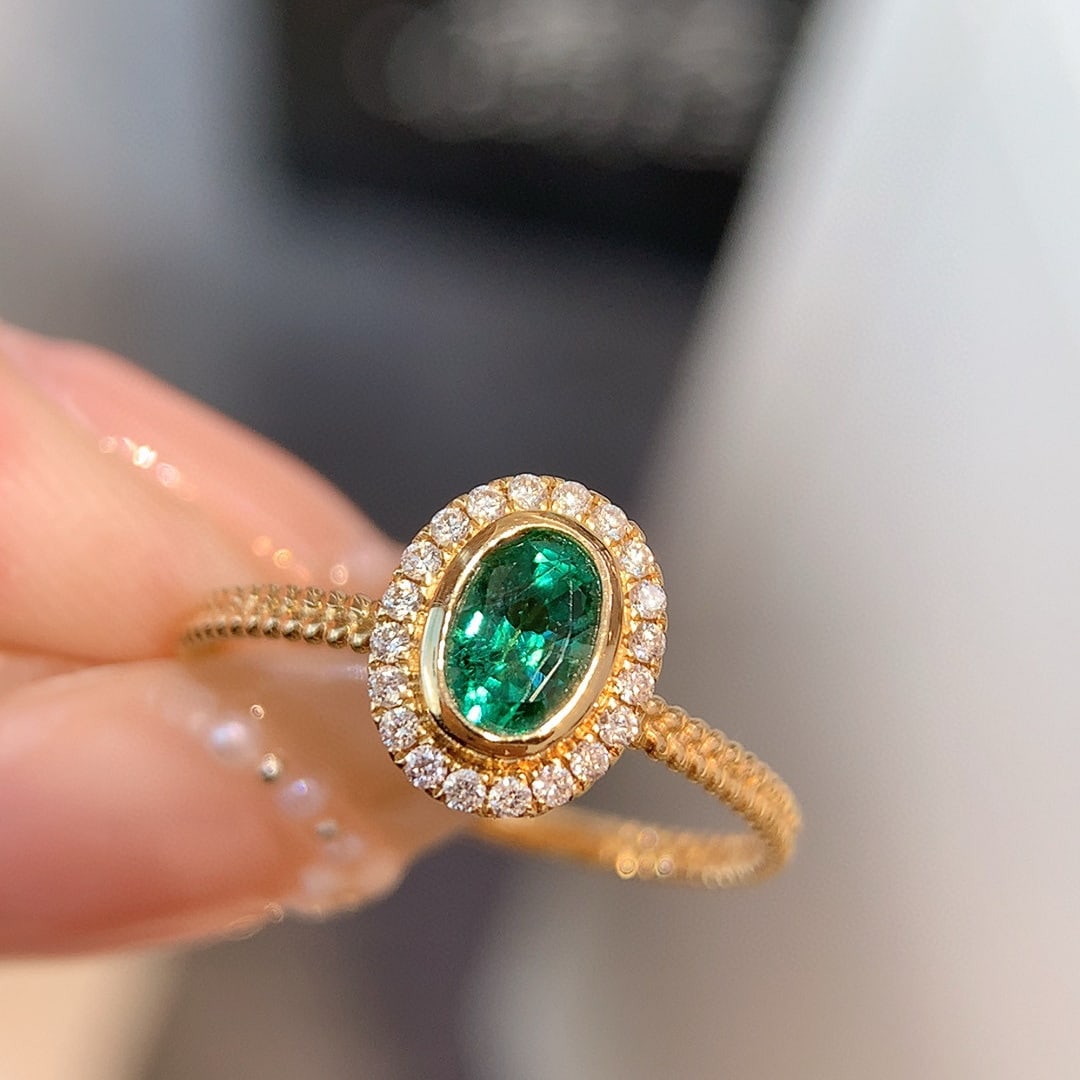 14k Gold 0.71 Ctw Vivid Green Natural Emerald & Diamond Ring: Ref:230998183 // gold content:14k gold // ring size:7. 25us // // main gemstone:emerald // shape:oval // carat weight:0. 61ct // color:vivid green // treatment:natural // // adjacent gemstone 2 :