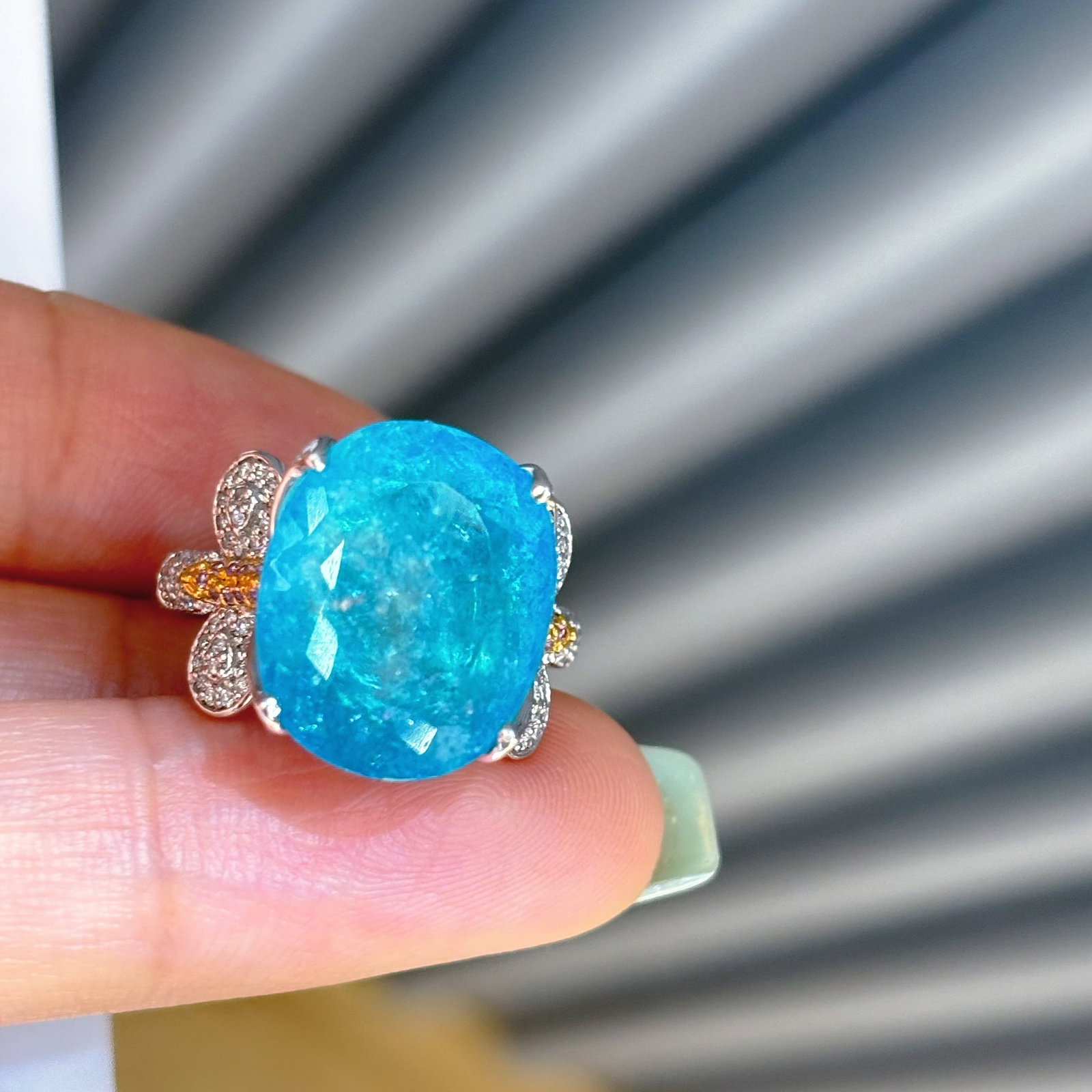 14k Gold 9.9 Ct Natural Paraiba Tourmaline & Diamond Ring: Ref:230998212 // gold content:14k gold // ring size:7. 25us // // main gemstone:paraiba tourmaline // shape:oval // carat weight:9. 9ct // color:blue // treatment:natural // // adjacent gemstone 2 :