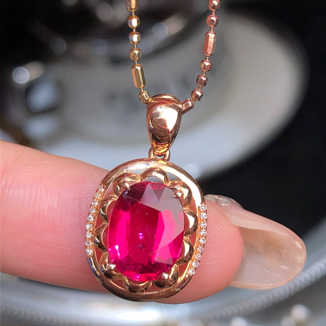 14k Gold 2.20 Ct Natural Tourmaline & Diamond Pendant( Without Chain ): Ref:230998290 // gold content:14k gold // main gemstone:tourmaline // shape:oval // carat weight:2. 20ct // color:red // treatment:natural // // adjacent gemstone 2 : diamond // number of stones:18 //