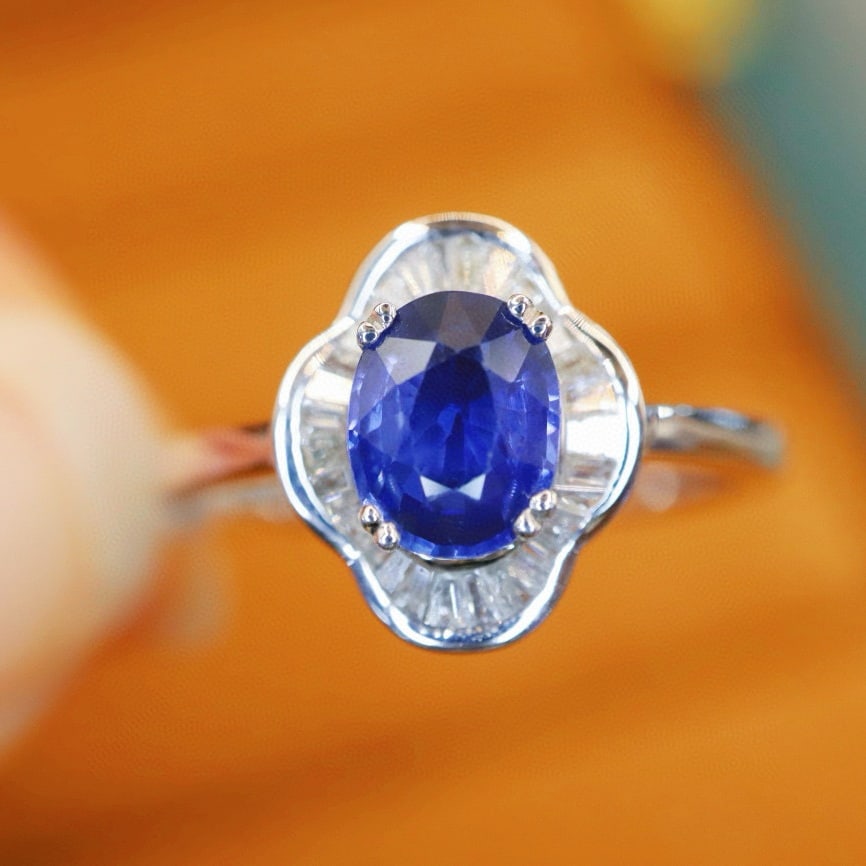 14k Gold 1.23 Ctw Natural Sapphire & Diamond Ring: Ref:230998317 // gold content:14k gold // ring size:7. 25us // // main gemstone:sapphire // shape:oval // carat weight:1. 05ct // color:royal blue // treatment:natural // // adjacent gemstone 2 :