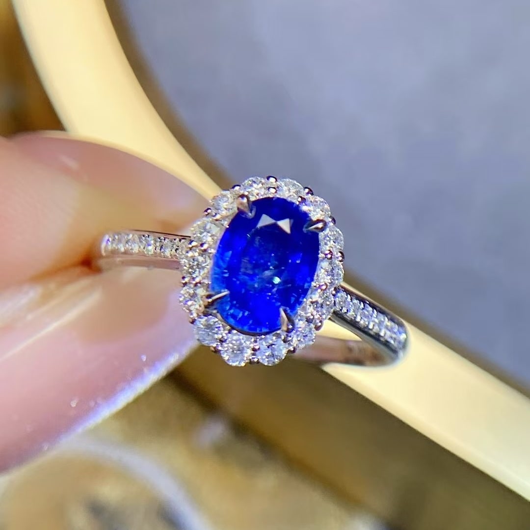 14k Gold 1.45 Ctw Vivid Blue Natural Sapphire & Diamond Ring: Ref:230998330 // gold content:14k gold // ring size:7. 25us // // main gemstone:sapphire // shape:oval // carat weight:1. 15ct // color:vivid blue // treatment:natural // // adjacent gemstone 2 :