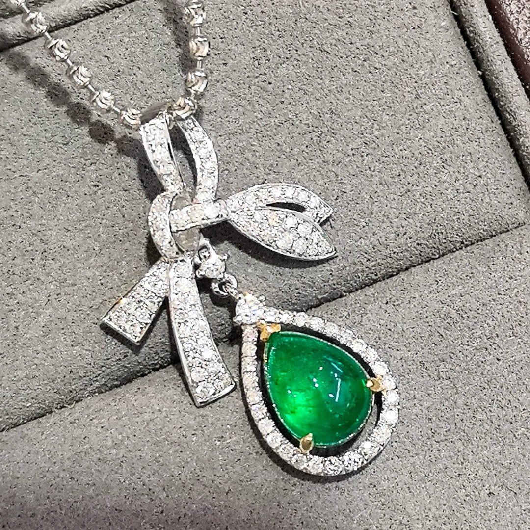 14k Gold 2.45 Ctw Vivid Green Natural Emerald & Diamond Pendant( Without Chain ): Ref:230998342 // gold content:14k gold // main gemstone:emerald // shape:pear // carat weight:1. 89ct // color:vivid green // treatment:natural // // adjacent gemstone 2 : diamond // shape:round //