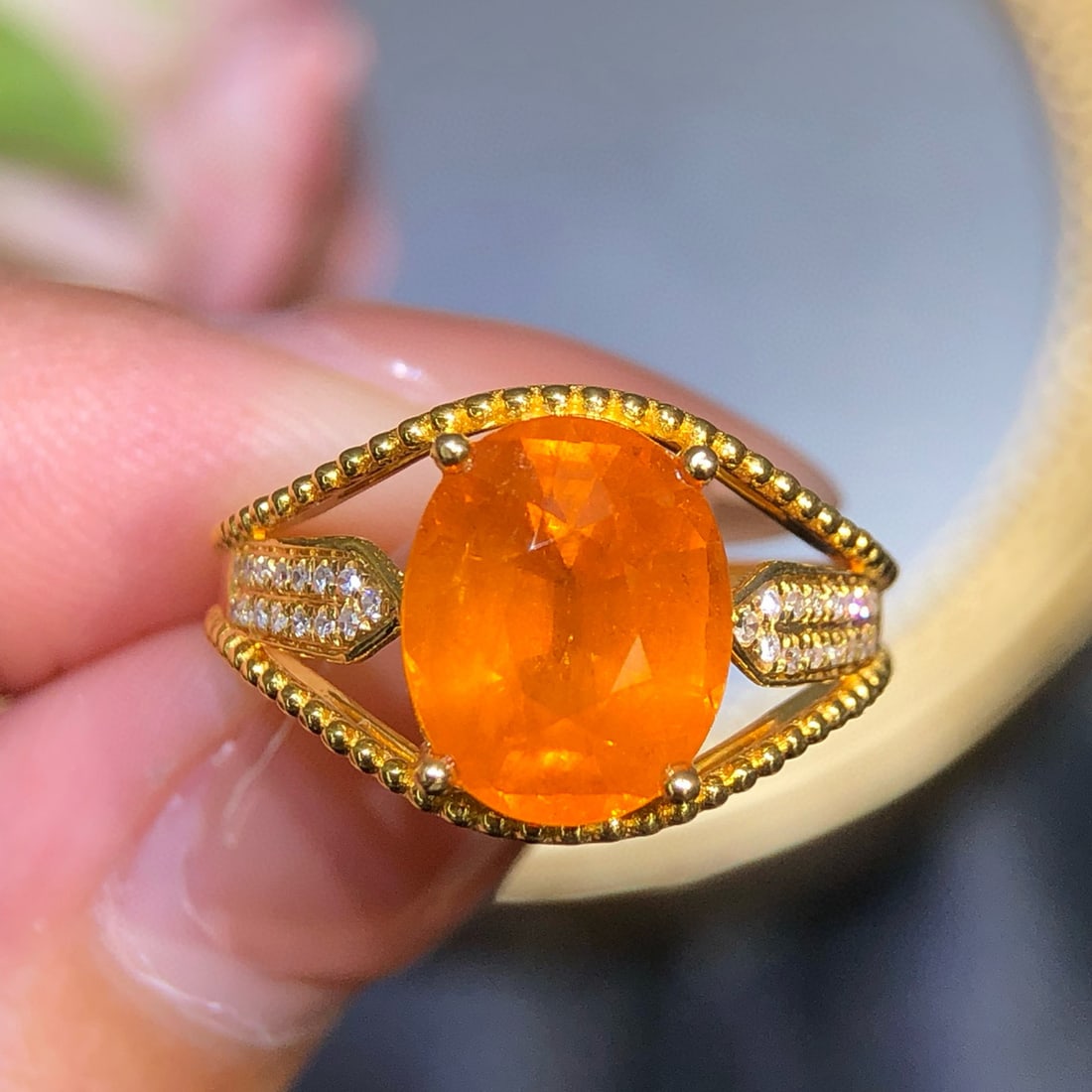 14k Gold 4.85 Ct Natural Spessartine & Diamond Ring: Ref:230998363 // gold content:14k gold // ring size:7. 25us // // main gemstone:spessartine // shape:oval // carat weight:4. 85ct // color:orange // treatment:natural // // adjacent gemstone 2 :