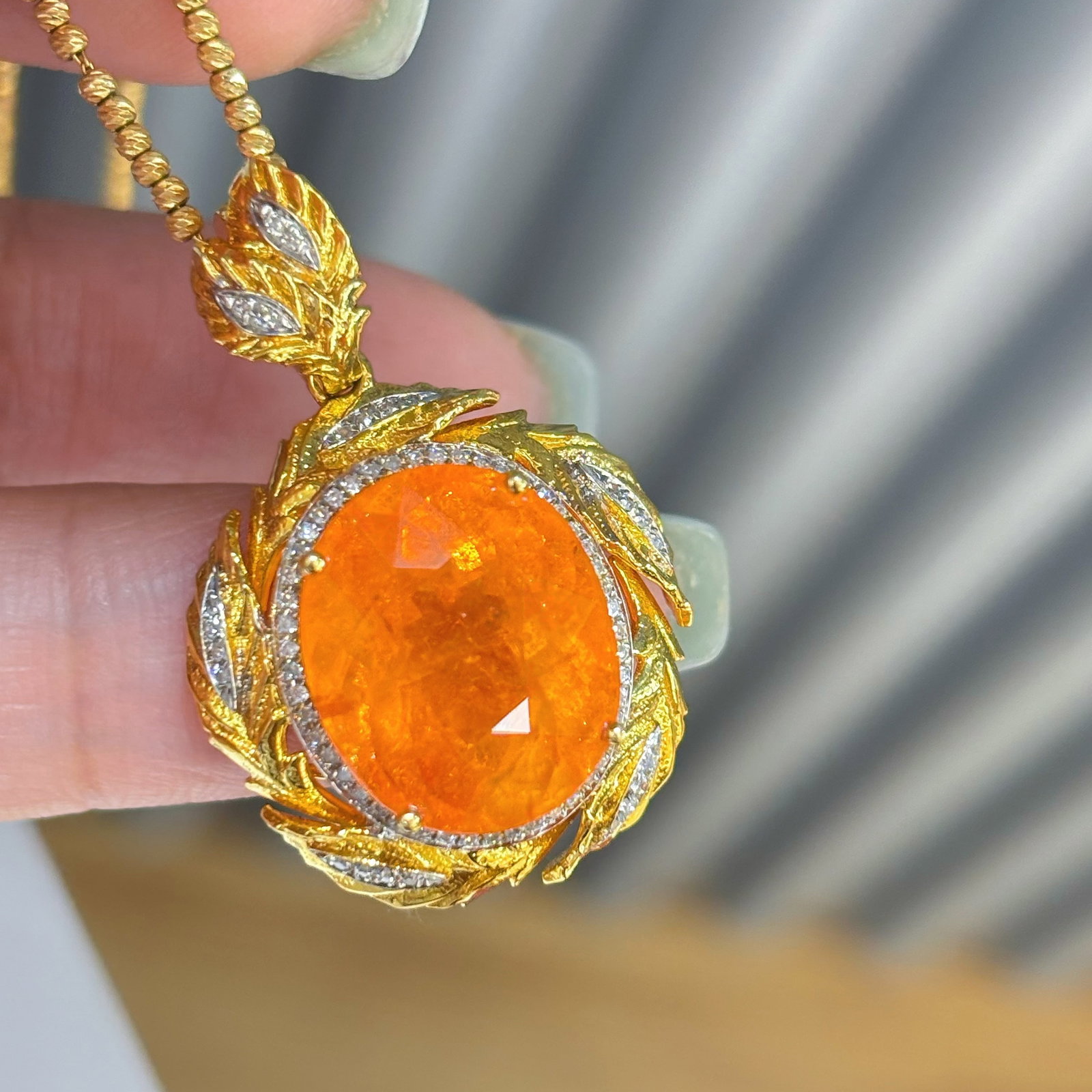 14k Gold 11.75 Ct Natural Spessartine & Diamond Pendant( Without Chain ): Ref:230998364 // gold content:14k gold // main gemstone:spessartine // shape:oval // carat weight:11. 75ct // color:orange // treatment:natural // // adjacent gemstone 2 : diamond // shape:round //