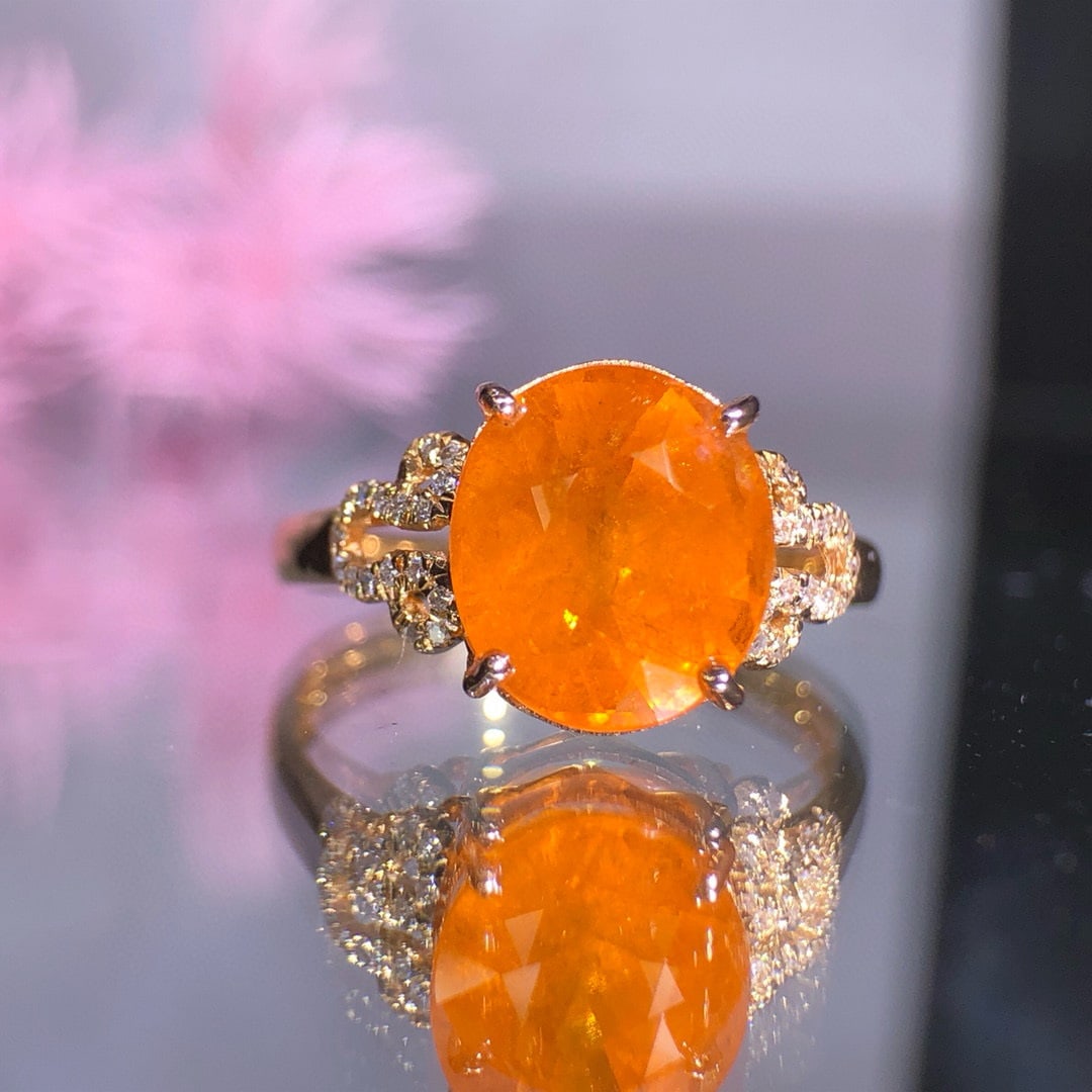 14k Gold 4.3 Ct Natural Spessartine & Diamond Ring: Ref:230998365 // gold content:14k gold // ring size:7. 25us // // main gemstone:spessartine // shape:oval // carat weight:4. 3ct // color:orange // treatment:natural // // adjacent gemstone 2 :