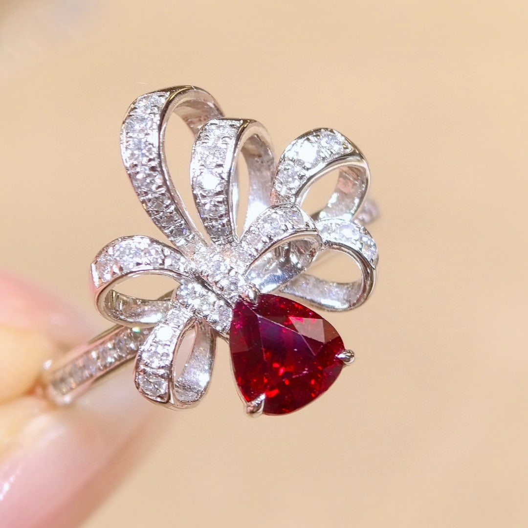 14k Gold 1.43 Ctw Natural Ruby & Diamond Ring: Ref:230998377 // gold content:14k gold // ring size:7. 25us // // main gemstone:ruby // shape:pear // carat weight:1. 05ct // color:pigeonblood red // treatment:natural // // adjacent gemstone 2 : dia