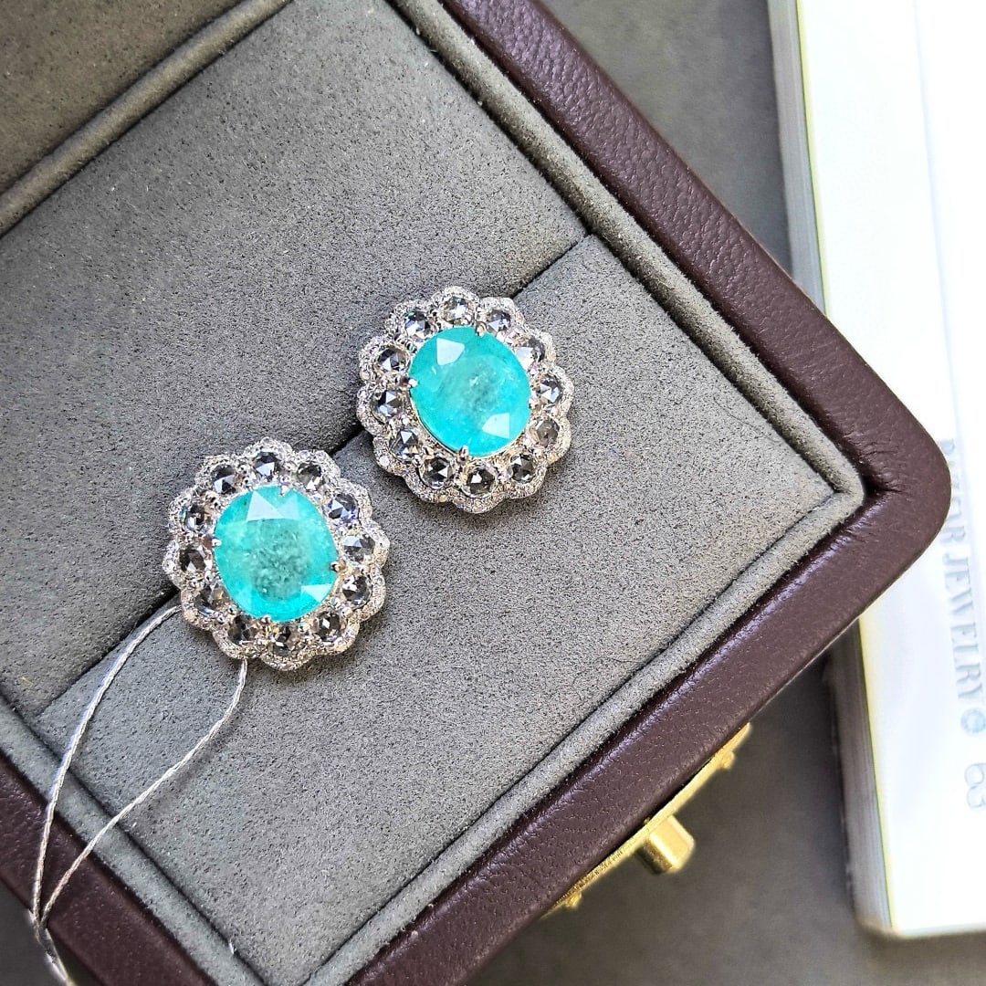 14k Gold 5.54 Ctw Natural Paraiba Tourmaline & Sapphire Earrings: Ref:230998387 // gold content:14k gold // main gemstone:paraiba tourmaline // shape:oval // carat weight:3. 78ct // color:blue // treatment:natural // // adjacent gemstone 2 : sapphire // shape:round 