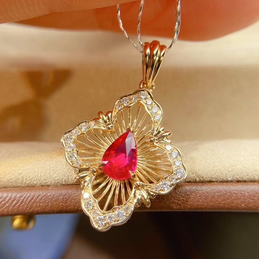 14k Gold 0.68 Ctw Vivid Red Natural Ruby & Diamond Pendant( Without Chain ): Ref:230998391 // gold content:14k gold // main gemstone:ruby // shape:pear // carat weight:0. 53ct // color:vivid red // treatment:natural // // adjacent gemstone 2 : diamond // shape:round // carat