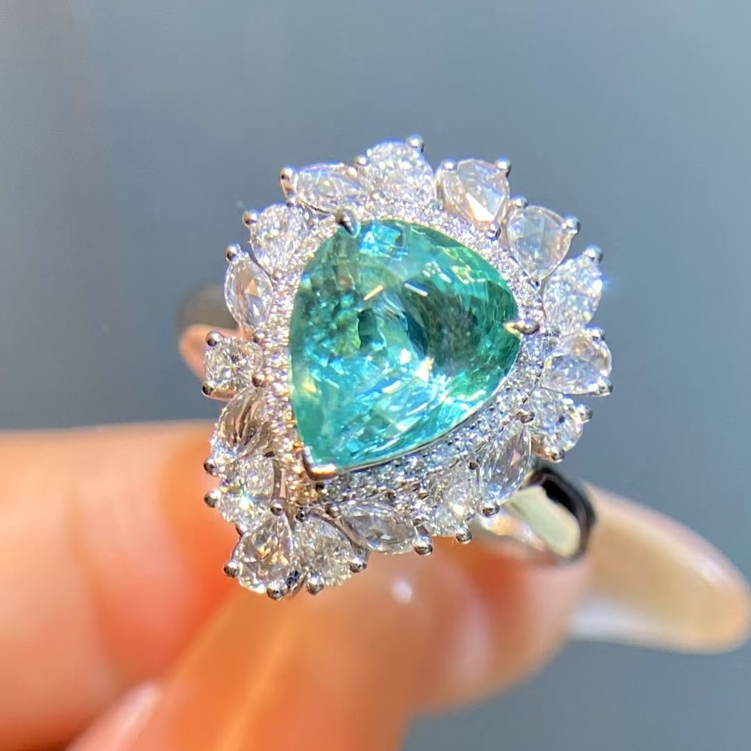 14k Gold 3.53 Ctw Natural Paraiba Tourmaline & Diamond Ring: Ref:230998390 // gold content:14k gold // ring size:7. 25us // // main gemstone:paraiba tourmaline // shape:pear // carat weight:2. 68ct // color:blue // treatment:natural // // adjacent gemstone 2 : 