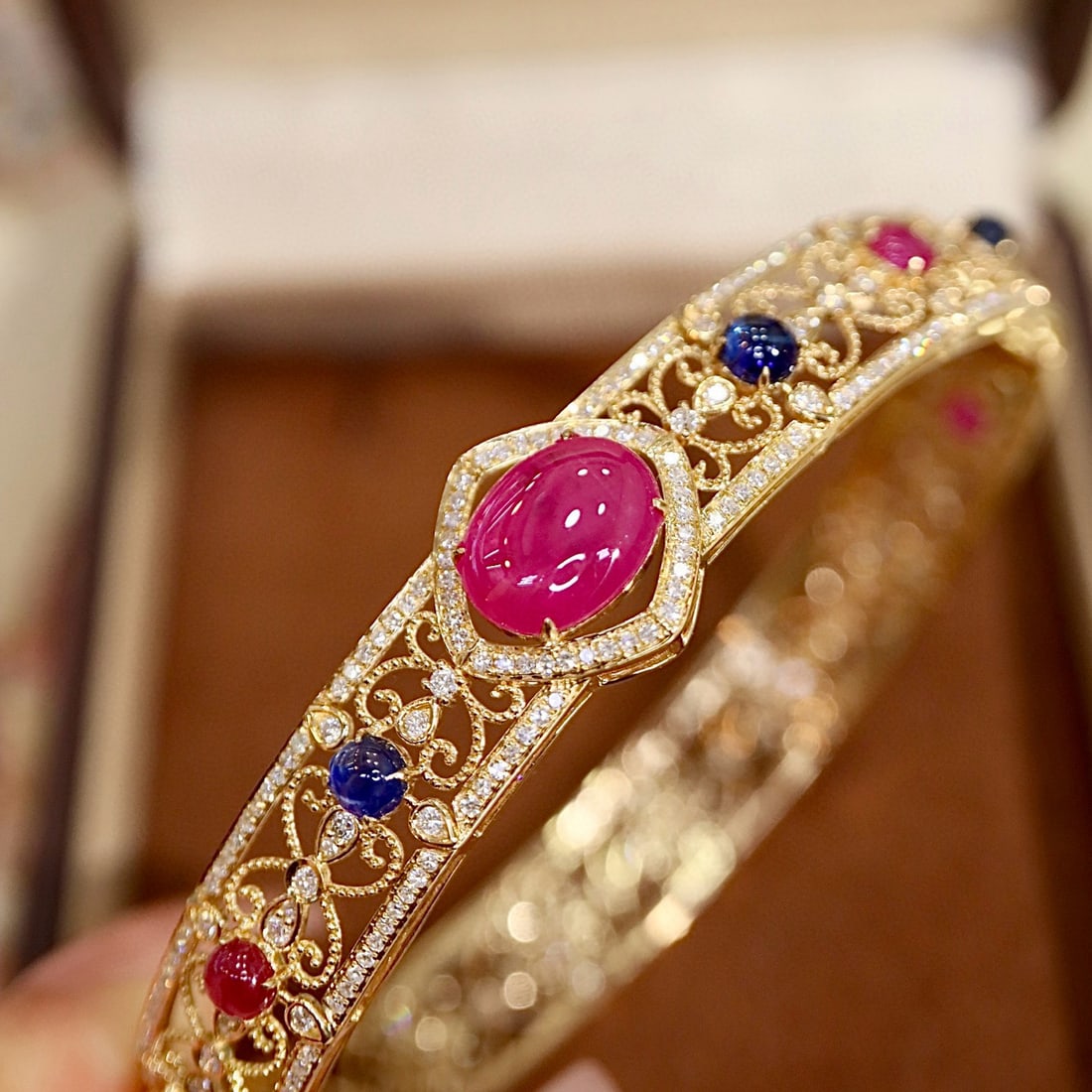 14k Gold 6.00 Ctw Natural Ruby & Diamond Bangle: Ref:230998414 // gold content:14k gold // main gemstone:ruby // shape:multiply // carat weight:4. 96ct // color:red // treatment:natural // // adjacent gemstone 2 : diamond // shape:round // carat